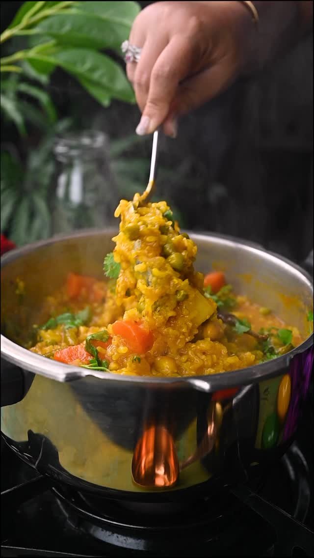 No Onion No Garlic Gujarati Vaghareli Khichdi or Masala Khichdi 
.
This is the ultimate comfort food for me! A classic Gujarati dish made with rice, mixed dals, and flavorful spices. The word masala refers to a blend of spices commonly used in Indian cooking. This No Onion No Garlic recipe is easy, delicious, and a perfect one pot meal!
.
Comment “KHICHDI” and I’ll send the recipe straight to your inbox