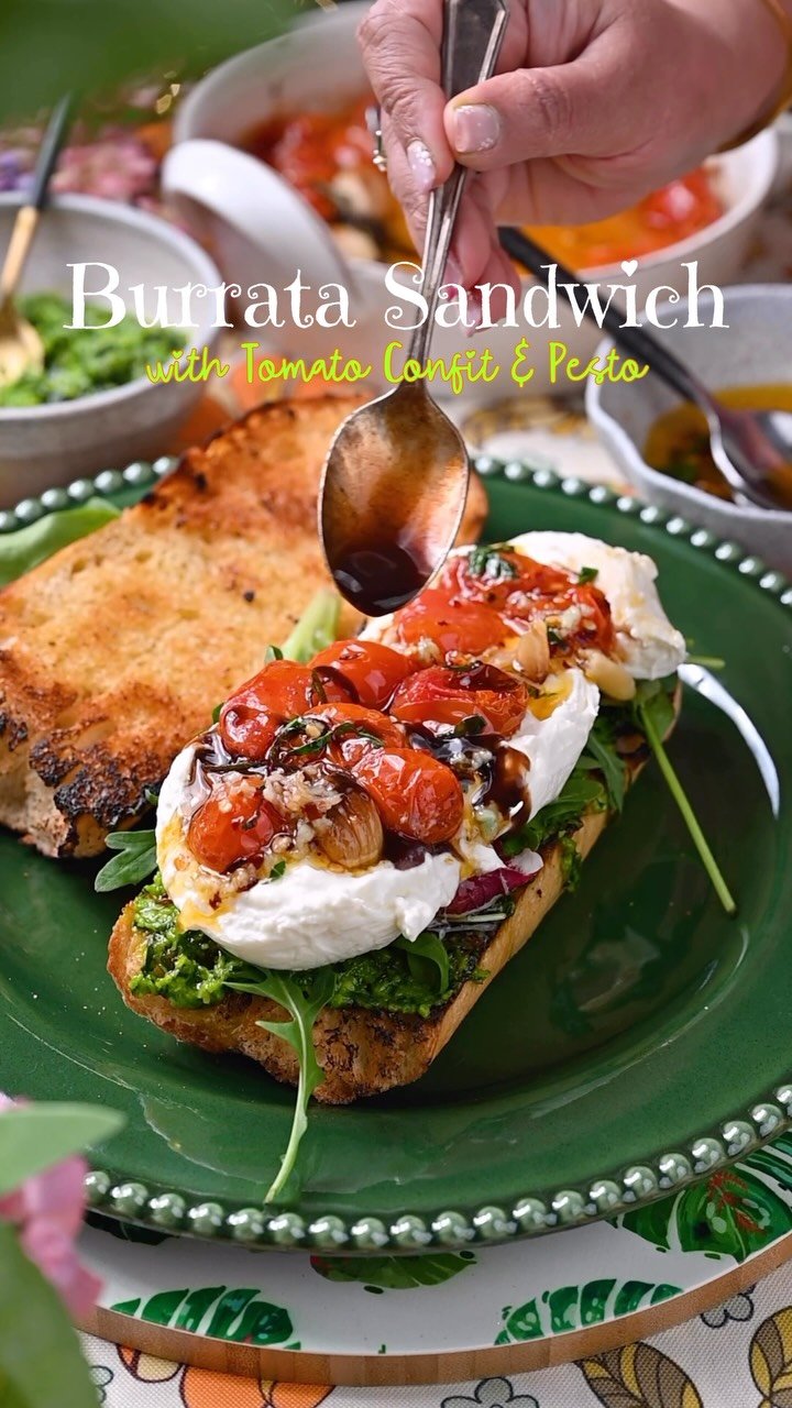 The Ultimate Burrata Sandwich 
Crispy rustic bread, creamy burrata, juicy tomato garlic confit, fresh basil pesto, and a drizzle of basil chili oil, every bite is a flavor explosion!
Perfect for brunch, lunch, or when you’re craving something gourmet yet comforting.
.
Comment “Sandwich” for the full recipe in your inbox!