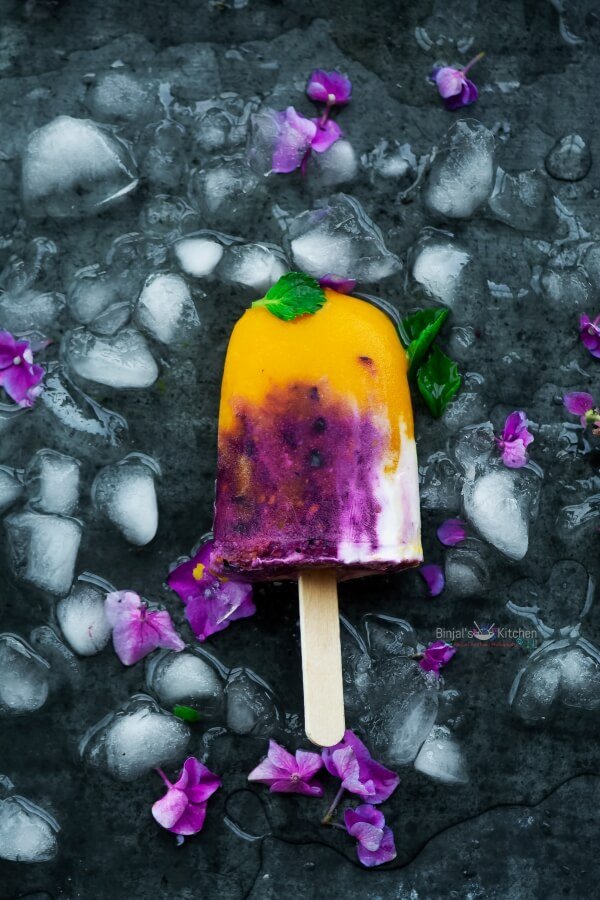 Colorful abstract digital art with vibrant purple, pink, and blue hues.