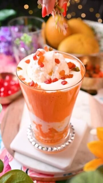Mango Mastani 
.
Pune’s iconic Mango milkshake but made at home! Thick, creamy, loaded with mango flavor, and topped with all the good stuff.
This summer treat is a must try while mangoes are in season 
.
Comment “MANGO” and I’ll send the recipe to your inbox 💛