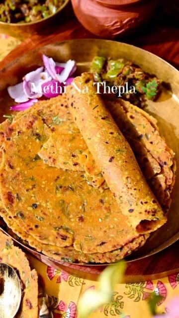 Methi Thepla 
A Gujarati Classic! 
This soft, flavorful flatbread made with fresh fenugreek leaves, whole wheat flour, and spices is a true staple in every Gujarati kitchen. Perfect for breakfast, lunch, or travel, it stays fresh for days and pairs beautifully with pickle or yogurt.
Tastes like home in every bite! 
.
Comment “THEPLA” to get the full recipe in your inbox!
