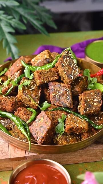 Kothimbir vadi
A popular Maharashtrian teatime snack, made with coriander leaves, chickpeas flour and spices. Its steamed and then deep fried until crisp and golden brown. This vadi literally translates to coriander fritters. As the name suggests, coriander leaves are the main ingredient. 
.
Comment “ VADI “ I’ll send recipe to your inbox.
.
.
.
.
.
.
.
.
.
.