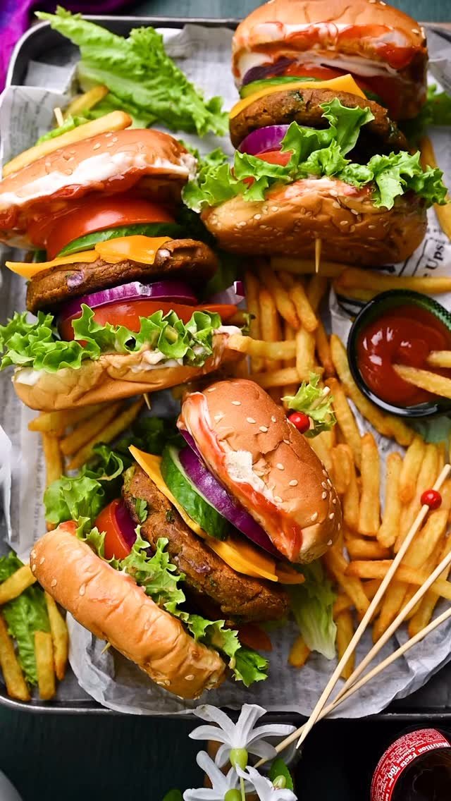 Veggie Burger is one of my favorite! 
It has everything what I want, healthy and tasty. This burger made with chickpeas/Garbanzo beans, multigrain flour and veggies like carrot, capsicum, red bell pepper with nutty flavor. Satisfy your appetite with a great-taste and it’s easy to make and can be ready in less than 30 minutes. This meatless and eggless burgers are totally awesome. I think I’d rather have one than any cheeseburger at a restaurant.
.
Comment “ BURGER “ I’ll send full recipe to your DM/inbox 
.
.
.
.
.
.
.
.
.
.
.
.
Burger, chickpeas, high protein, healthy, easy, kids food, restaurant food, Indian, street food, cheese burger 
.
.
.
