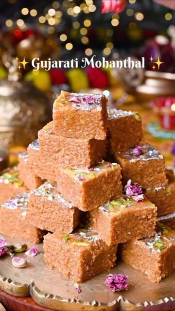 Mohanthal ✨ 
Favorite Traditional Gujarati Sweet
.
.
Mohanthal is one of the most beloved traditional Indian sweets of Gujarat and Rajasthan, made with gram flour, ghee, sugar and nuts, known for its rich fudgy texture and nutty aroma. Mohan means Lord Krishna and thal means bhog or prasad, and this is one of Lord Krishna’s favorite sweets. A must make for special occasions like Diwali and wedding ceremonies ✨
.
.
.
💬 Comment “MOHANTHAL” below and I will share the recipe straight to your inbox!
.
.
.
👉 Follow @binjalsvegkitchen for traditional festive Indian sweets!