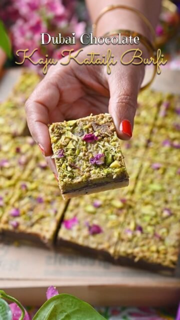 ✨ Dubai Chocolate Kaju Kataifi Burfi 💚🍫

The viral Dubai Chocolate meets classic Indian Kaju Burfi in this irresistible fusion mithai! A soft kaju layer topped with silky chocolate and crispy pistachio kataifi mixed with rich pistachio cream. 🤎💚

Perfect for Raksha Bandhan, Janmashtami, Diwali & festive gifting! 🎁✨

💬 Comment “DUBAI” and I’ll send you the full recipe!

Follow @binjalsvegkitchen for more delicious vegetarian recipes & festive treats! ❤️